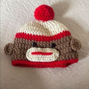 Handmade crocheted Sock Monkey toilet tissue cover